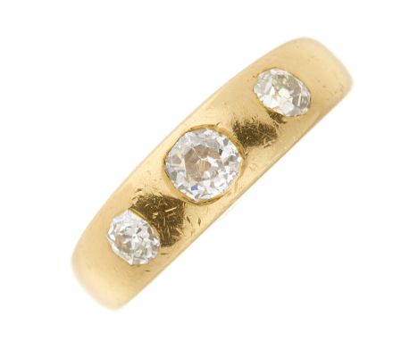 A late Victorian 18ct gold old-cut diamond three-stone band ring, estimated total diamond weight 0.70ct, J-K colour, SI clari