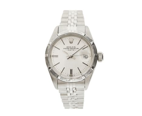 Rolex, a stainless steel Oyster Perpetual Date bracelet watch, circa 1972, linen dial, engine turned bezel, reference 6919, s