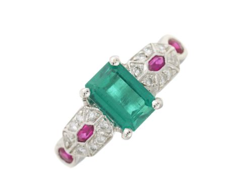 A platinum, emerald, vari-shape ruby and brilliant-cut diamond dress ring, emerald estimated weight 1.50ct, estimated total d