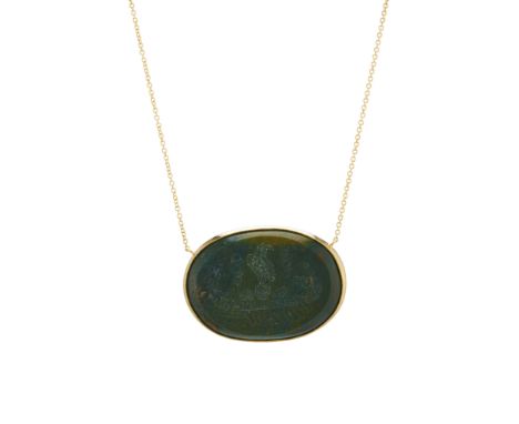 An 18ct gold hardstone intaglio cabochon pendant, carved to depict a Viking ship with dragon head and bird motif, with integr