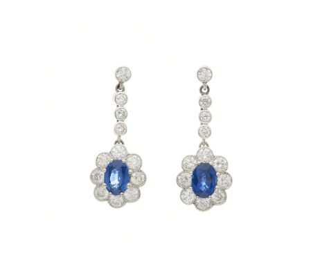 A pair of 18ct gold oval-shape sapphire and brilliant-cut diamond cluster drop earrings, with similarly-cut diamond articulat