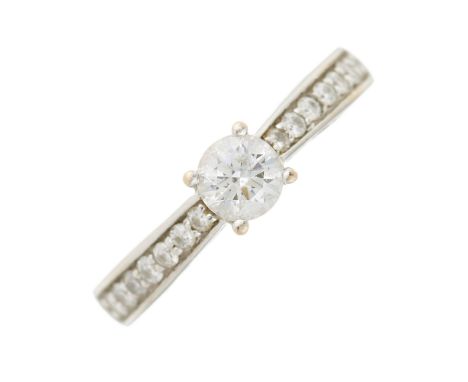 An 18ct gold Tolkowsky-cut diamond single-stone dress ring, with brilliant-cut diamond gallery and shoulders, total diamond w