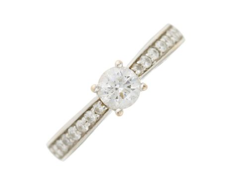 An 18ct gold Tolkowsky-cut diamond single-stone dress ring, with brilliant-cut diamond gallery and shoulders, total diamond w