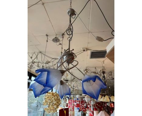 A pair of five-arm spiral chrome chandeliers with blue petal glass shades, silver height adjustable chain, requires 5 x small