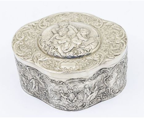 An early 20th Century Continental probably German 800 standard silver tea caddy, quatrefoil shaped profusely chased and embos