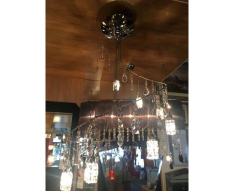 A genuine Swarovski nine light chrome and crystal pendant with a spiral design, each light is suspended by a clear cable whic