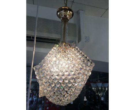 A one light crystal drape pendant with glass tube stem and height adjustable gold-plated chain and cups, design of drape can 