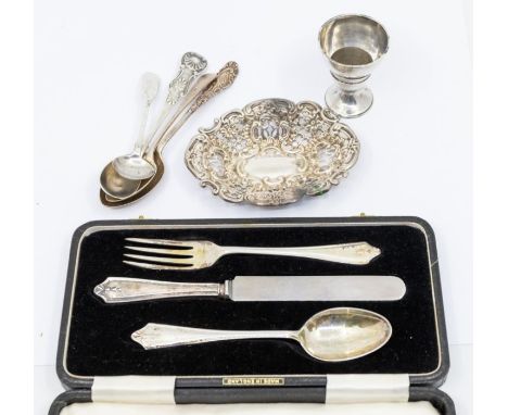 An assorted collection of silver to include: A Chester hallmarked small bonbon dish - pierced work, marked for Stokes and Ire