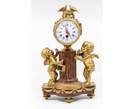 A good French mantel clock of small proportions with single train movement. balance escapement2 1/2 " porcelain dial with rom