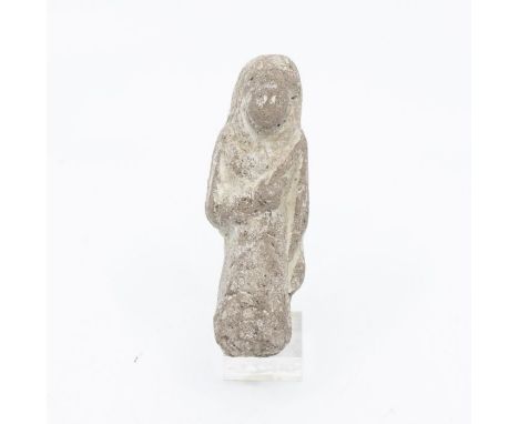 Egyptian Terracotta Overseer ShabtiThird Intermediate Period, Circa 900 BC.A figure in the form of an overseer holding two ag