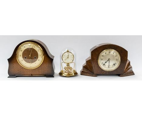 Two mid 20th Century mantle clocks, along with mid 20th Century German anniversary clock
