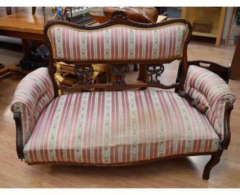 Late Victorian two seater sofa chair with mahogany frame one leg off but present, along with a Victorian mahogany button back