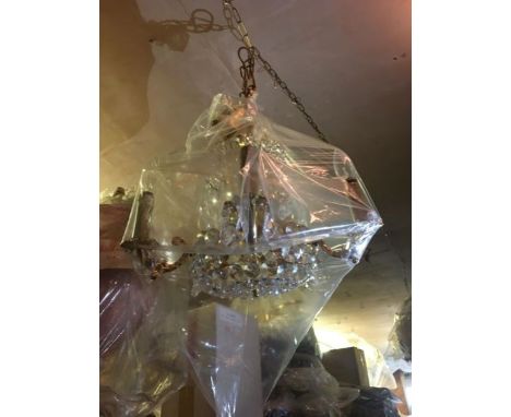 A genuine Swarovski Austrian Strass five light crystal and gold finish chandelier, consists of crystal buttons and bomb drops