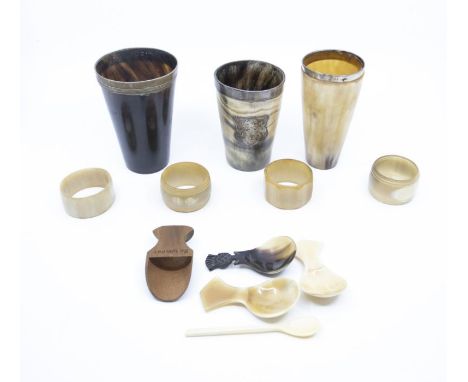 A collection of 19th Century horn beakers, various sizes, one with silver mounted rim and applied shield with monogram; one w