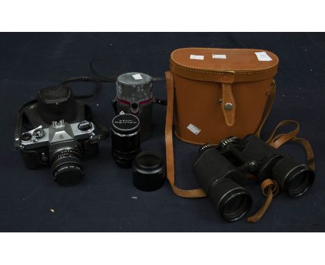 An Asahi Pentax Spotmatic F Japanese camera with a SMC Takumar lens in a leather case along with an Asahi Pentax super multi 