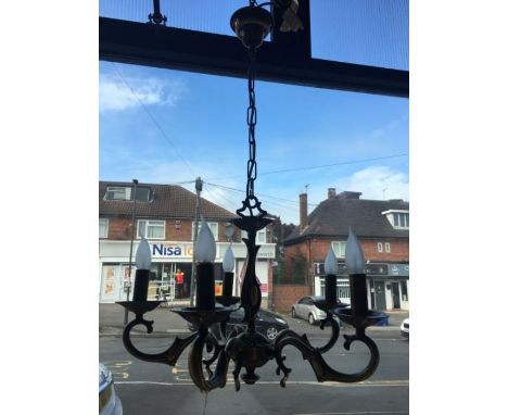 A good quality five-arm solid brass antique finish chandelier, height chain adjustable, includes five 25W bohemian frosted ca