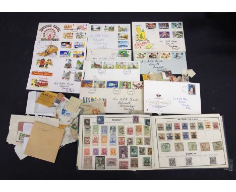 A collection of stamps, including a school boy album, loose, and First Day Covers&nbsp;