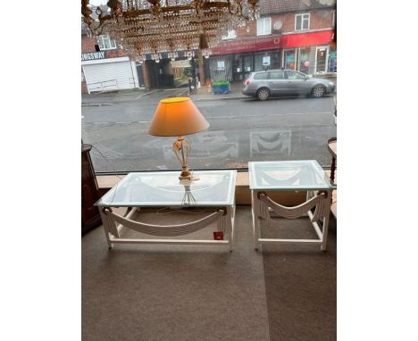 A matching set of two metal frame coffee tables and a table lamp; both tables have toughened glass tops, each table has a cre