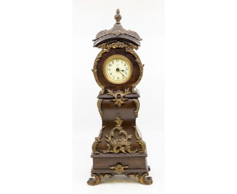 Miniature longcase clock in the Dutch style. Spring driven movement. 2 (1/2)" round dial with Arabic numerals, contained in a