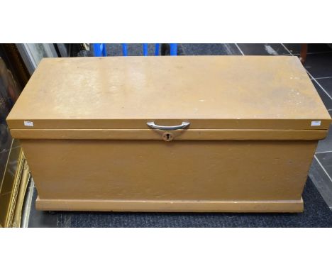 A late 20th Century toolbox containing a collection of wooden planes and various other tools