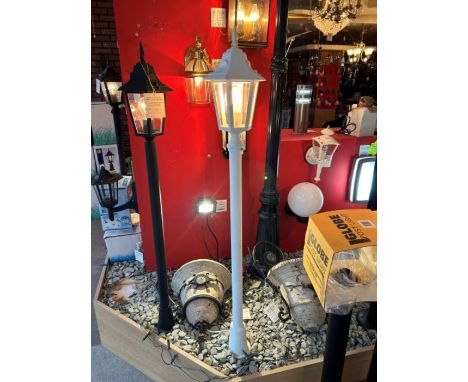 Seven 1.2m white aluminium outdoor post lights, consists of six clear Perspex panels and a round base, requires a Edison scre
