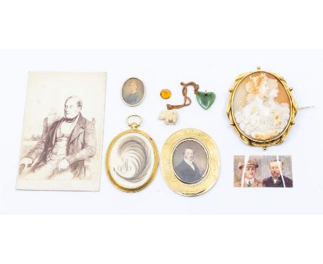 A 19th century mourning cameo brooch, carved with&nbsp;Zeus, Hera, Mercury and an eagle, with leaf and bead decorative border