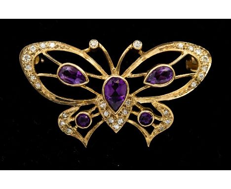 An amethyst and diamond 9ct gold butterfly brooch, comprising pear cut and round cut amethysts, diamond set wings, length app