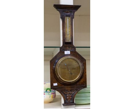 An early 20th Century oak wall barometer TR Watkins &amp; Sons, Green Lane in Derby