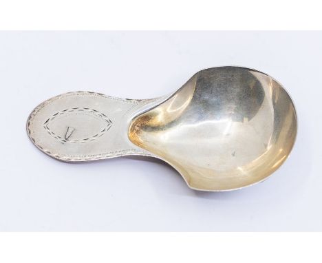 A George III silver caddy spoon with gilt bowl and engraved decoration, vacant cartouche,&nbsp;hallmarked by George Smith and