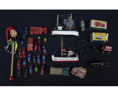 Collection of mixed toys including boxed Matchbox car days gone vehciles, wooden boats etc including Thomas the Tank Engine m