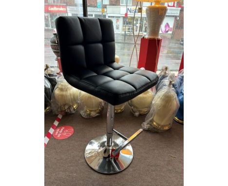 Three chrome and faux black leather bar stools with hydraulic lift mechanism.  RRP £160 (each) (3)Condition: All shop soiled 