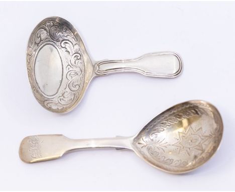 Two Georgian silver caddy spoons, one is with engraved repoussé work, hallmarked London 1825 by William Traies, and the other