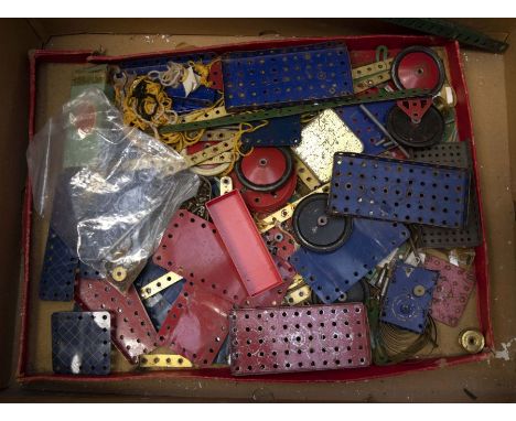 One box containing vintage Meccano pieces with original packaging, set of vintage cast metal scales with graduating brass wei