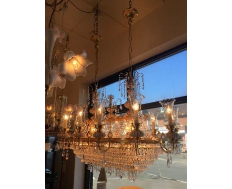 A genuine Swarovski Austrian Strass 32 light crystal chandelier, ‘the boat chandelier’ consists of a gold-plated frame, ceram