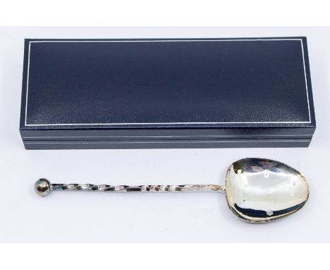 A Modern silver spoon: The Millenium Spoon, designed by Steven Green, hallmarked by R&amp;R., Birmingham, 2000, approx 1.23 o