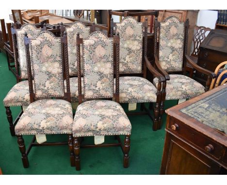 Six reproduction 20th century dining chairs, two of which are carvers with tapestry style seats and backs