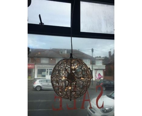 A low voltage halogen chrome mesh a crystal bead pendant, aspherical design with adjustable height, not compatible with a dim