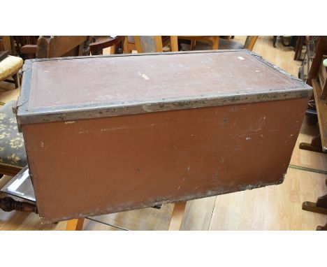 A British military trunk with locking clips and carry handles