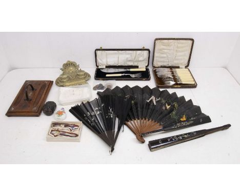 A collection of items to include: a 'Depose' ink stand with ceramic liners; a wooden pen stand; 3 lacquered fans; pieces of f