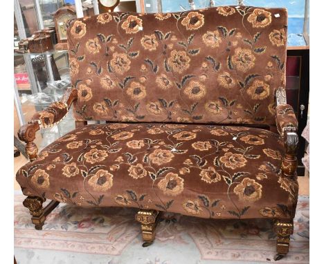 An early 20th century reproduction upholstered&nbsp;two-seater sofa chair, in the 18th century style,&nbsp;with wooden arms a