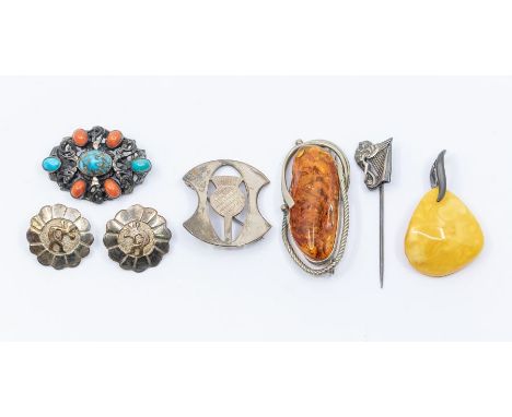 An amber and white metal brooch, length approx 50mm, a Baltic amber and white metal pendant, length approx 40mm, a turquoise 