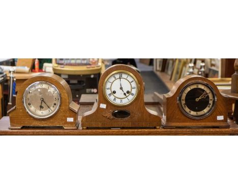 1. A Garrand clocks Ltd 3 train mantel clock, retailed by Pearce & Sons Ltd Leicester, chiming on rods, with 6" silvered dial