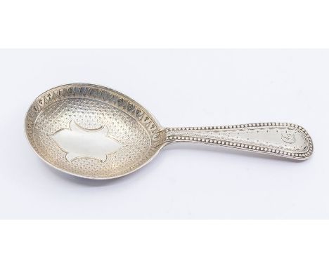 A Victorian silver caddy spoon with engraved decoration, initial D to handle, hallmarked by Josiah Williams &amp; Co., Exeter