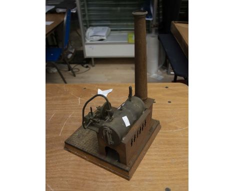 An early to mid 20th Century steam engine on stand