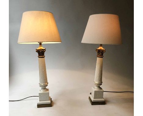 LAMPS, a pair, gilt metal Corinthian capped white and gold ceramic columns, 79cm H. (2)