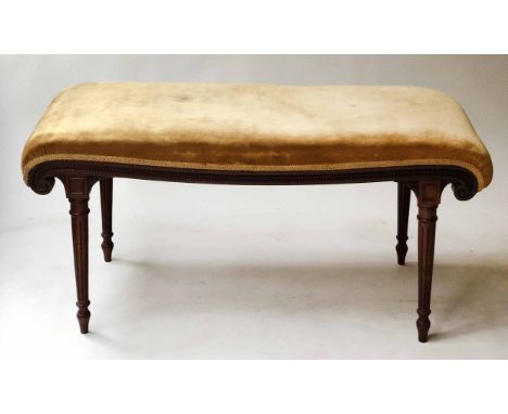 HEARTH STOOL, George III style mahogany with primrose yellow velvet upholstered seat and scroll fluted supports, 105cm x 41cm