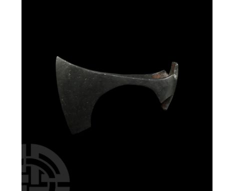 9th-11th century A.D. A hand-forged iron skeggöx (bearded axe) with asymmetrical triangular section narrow blade widening to 