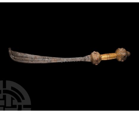 19th century A.D. An akrafena ceremonial sword comprising: a wooden hilt with sheet-gold surface, two drum-shaped lobes with 