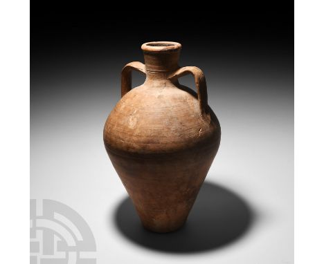 4th-5th century A.D. A substantial Mediterranean terracotta amphora jar with strap handles to the shoulder.  5.55 kg, 47.9 cm