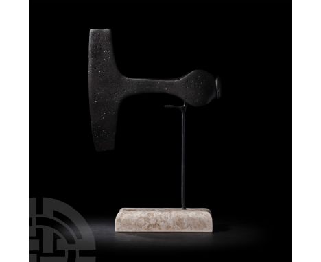 8th-11th century A.D. An iron axehead with a T-shaped profile comprising a rectangular-section shaft, blade with sub-rectangu